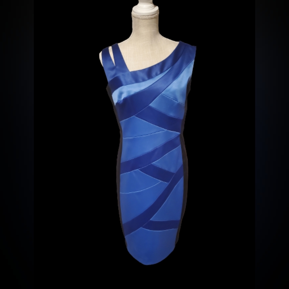 Women's sz. 10 asymmetrical Blue and Black Dress.
